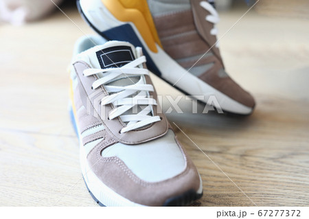 New sneakers standing on floor New sneakers standing on floor 67277372