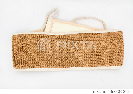Natural eco-friendly jute washcloth on a white 67280012