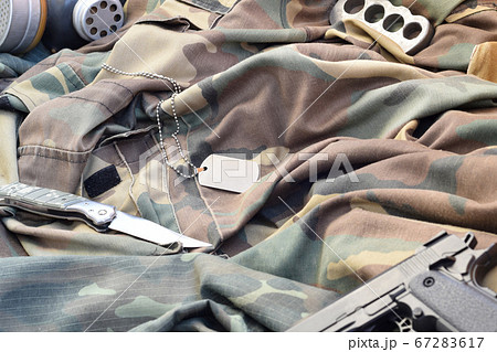 Stalker soldiers soviet gas mask lies with handgun Stalker soldiers soviet gas mask lies with handgun 67283617