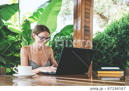 Woman work with laptop outside. 67296567
