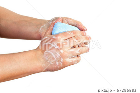 Young man wash hands with soap, closeup detail on 67296883
