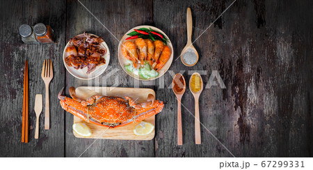 Sqide,jumbo crab and shrimp on dark background and Sqide,jumbo crab and shrimp on dark background and 67299331