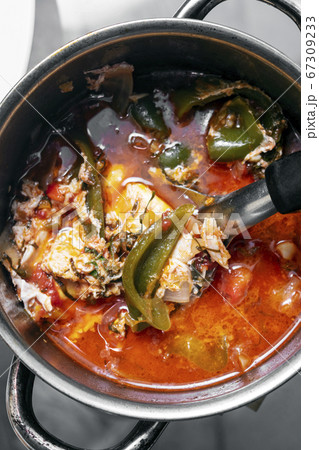 traditional spicy tomato and egg soup stew in traditional spicy tomato and egg soup stew in 67309233