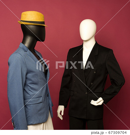 Two male mannequin in a black business suit and in 67309704