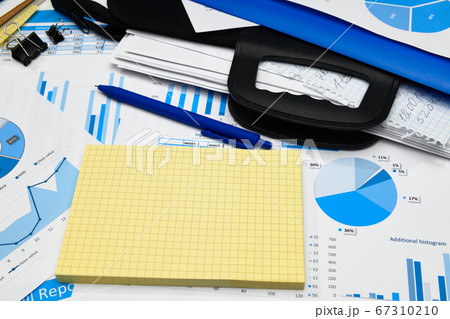 business office desk closeup - financial reports, business office desk closeup - financial reports, 67310210