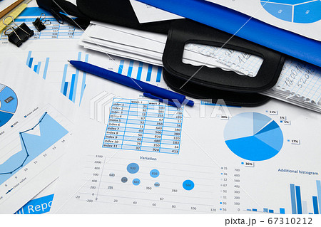 business office desk closeup - financial reports, 67310212
