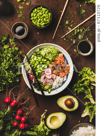 Salmon poke bowl or sushi bowl with vegetables Salmon poke bowl or sushi bowl with vegetables 67310726