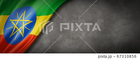 Ethiopian flag on concrete wall banner Ethiopian flag on concrete wall banner 67310856