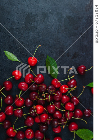 Cherry with leaf on plate and water dropsand on Cherry with leaf on plate and water dropsand on 67313024