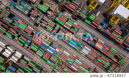 Aerial view of area with stacked containers at the 67318847