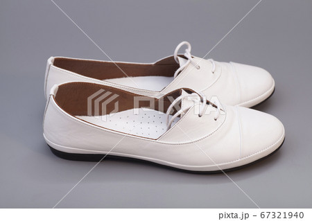 White Shoes isolated on gray background 67321940
