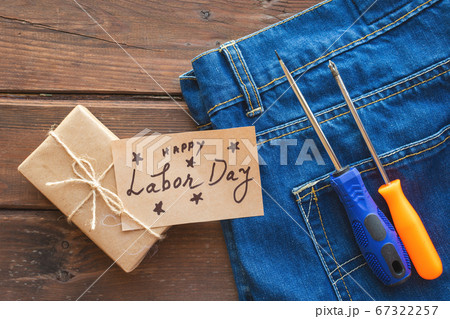 USA Labor day concept. Different kinds on wrenches, handy tools, craft tag. USA Labor day concept. Different kinds on wrenches, handy tools, craft tag. 67322257