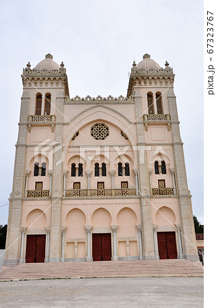 Tunis, TUNISIA - February 06, 2009: The Acropolium, or Saint Louis Cathedral, a 19th century church at Byrsa Hill in the ancient city of Carthage on outskirts of Tunis. Tunis, TUNISIA - February 06, 2009: The Acropolium, or Saint Louis Cathedral, a 19th century church at Byrsa Hill in the ancient city of Carthage on outskirts of Tunis. 67323767
