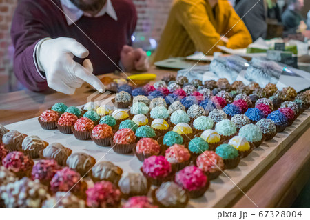 Assortment of colorful delicious fresh truffle cakes Assortment of colorful delicious fresh truffle cakes 67328004