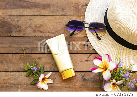 sunscreen spf50 cosmetics health care for skin face with hat ,sunglasses and flower frangipani sunscreen spf50 cosmetics health care for skin face with hat ,sunglasses and flower frangipani 67331878