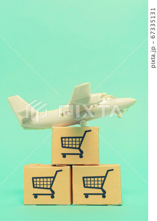 White model airplane lands on blue background from White model airplane lands on blue background from 67335131