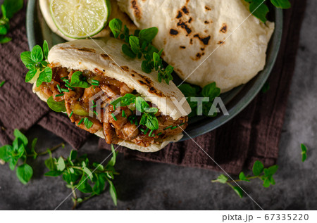 Homemade pita bread with meat and herbs 67335220