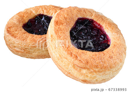 Sweet bun with berry filling isolated Sweet bun with berry filling isolated 67338993