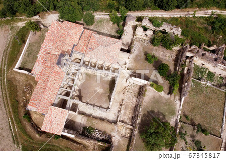 Aerial view of the Ruins Of An Ancient Abandoned Monastery In Santa Maria De Rioseco, Burgos, Spain. Aerial view of the Ruins Of An Ancient Abandoned Monastery In Santa Maria De Rioseco, Burgos, Spain. 67345817