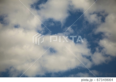 White clouds in summer blue sky White clouds in summer blue sky 67349664
