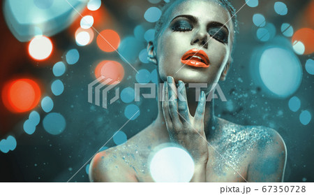 Beautiful woman with creative bright make-up Beautiful woman with creative bright make-up 67350728