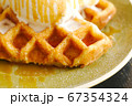 Cafe dessert Caramel Salty Waffle on top with whipping cream 67354324