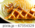 Cafe dessert Caramel Salty Waffle on top with whipping cream 67354329