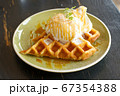 Cafe dessert Caramel Salty Waffle on top with whipping cream 67354388