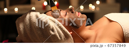 Beautician putting mask Beautician putting mask 67357849