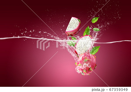 Water Splashing on Dragon Fruit or Pitaya over 67359349