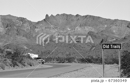 Ghost Town of Old Trails Sign on Route 66 in the Sonoran Desert, Arizona USA in Black and White Ghost Town of Old Trails Sign on Route 66 in the Sonoran Desert, Arizona USA in Black and White 67360349