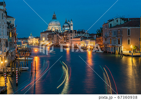 Basilica di Santa Maria della Salute and grand canal from Accademia Bridge at night in Venice, Italy. Basilica di Santa Maria della Salute and grand canal from Accademia Bridge at night in Venice, Italy. 67360938