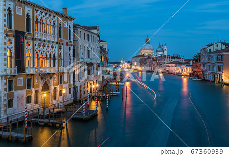Basilica di Santa Maria della Salute and grand canal from Accademia Bridge at night in Venice, Italy. Basilica di Santa Maria della Salute and grand canal from Accademia Bridge at night in Venice, Italy. 67360939