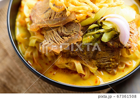 Northern Thai food (Khao Soi),Spicy curry noodles soup with beef  67361508
