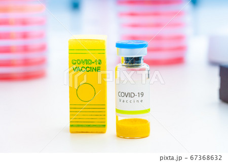 Coronavirus Covid-19 vaccine vial in medical lab, 67368632