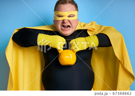 fat powerful superhero man show how strong he is 67368662