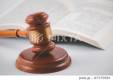 Old wood Judge hammer with law book Old wood Judge hammer with law book 67370094
