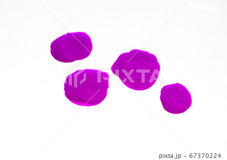 Four drops of nail Polish isolated on a white 67370224