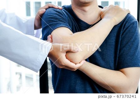 Physical therapy is doing shoulder and elbow therapy for patients in the hospital Physical therapy is doing shoulder and elbow therapy for patients in the hospital 67370241