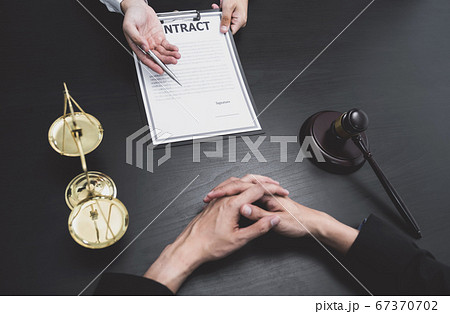 The male lawyer is providing service to consult business disputes to businessmen 67370702