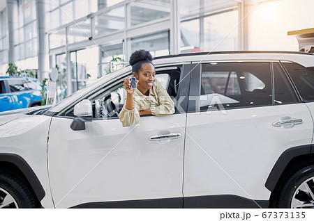 young african woman fulfilled her dream, bought a car 67373135
