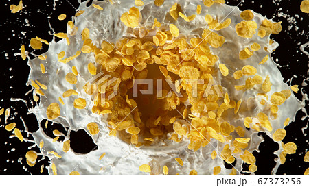 Freeze motion of rotating cereal pieces with milk 67373256