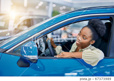 attractive afro woman dreams about new car attractive afro woman dreams about new car 67373989