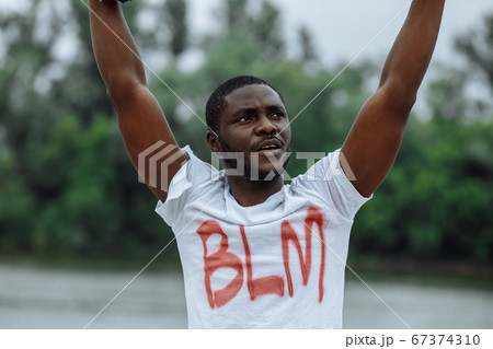 young black man in t-shirt with BLM inscription young black man in t-shirt with BLM inscription 67374310