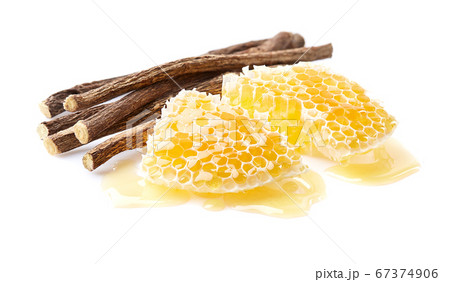 Liquorice root with honeycombs on white Liquorice root with honeycombs on white 67374906
