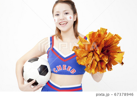 サッカーの応援するチアガールの写真素材