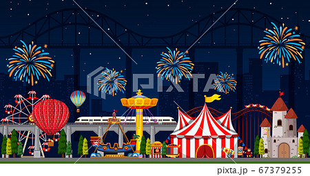 Amusement park scene at night with fireworks in 67379255
