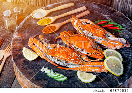 jumbo crab and spices herb on dark background jumbo crab and spices herb on dark background 67379655