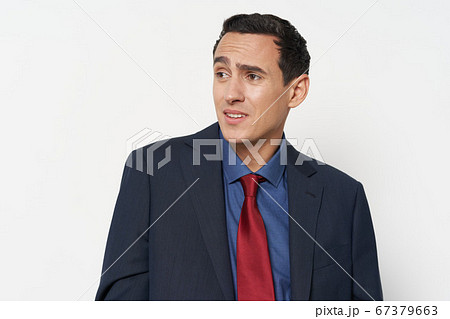 man on with irony looks away on an isolated background 67379663