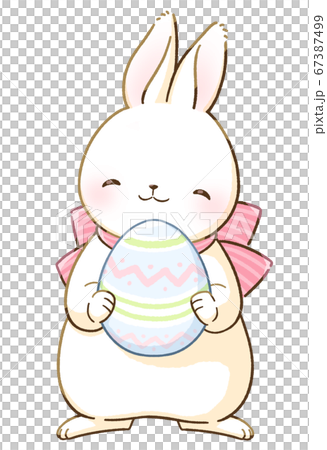 にっこり笑顔の白いうさぎとイースターエッグ 67387499